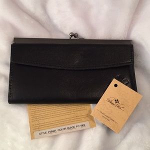Black leather wallet with metal snap closure.